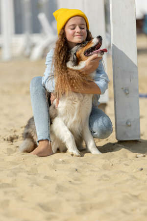 A child with a dog in nature. High quality photoの写真素材