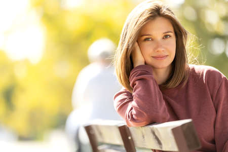 Beautiful woman. Young girl portrait in nature in autumn. High quality photoの写真素材