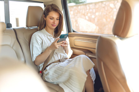 Woman passenger in the car. High quality photoの写真素材