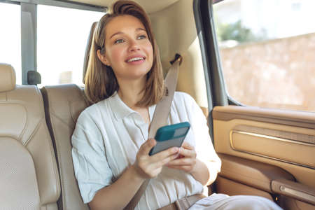 Woman passenger in the car. High quality photoの写真素材