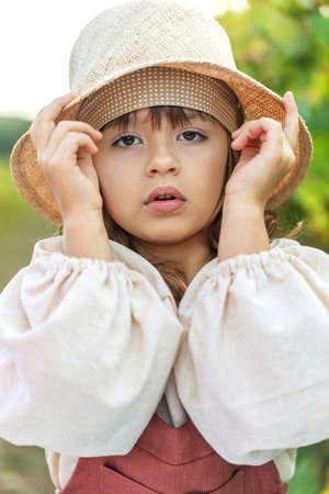 Fashionable little girl. Portrait of a child. High quality photoの写真素材
