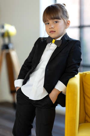 Fashionable child. The little girl is fashionably dressed. School style. High quality photoの写真素材