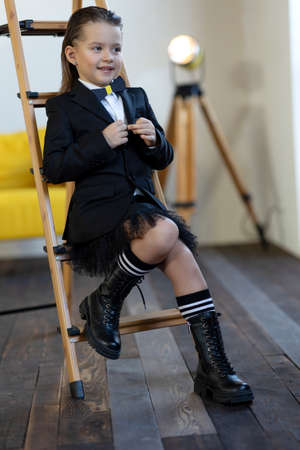 Fashionable child. The little girl is fashionably dressed. School style. High quality photoの写真素材