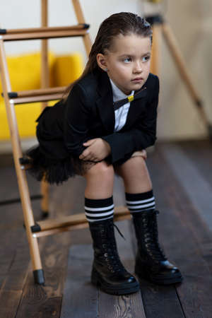 Fashionable child. The little girl is fashionably dressed. School style. High quality photoの写真素材