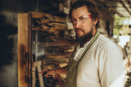 Male joiner at the workplace. High quality photoの写真素材