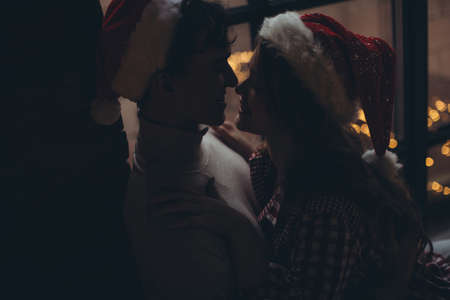 Boyfriend and girlfriend at Christmas. High quality photoの写真素材