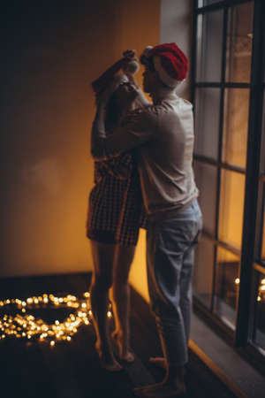 Boyfriend and girlfriend at Christmas. High quality photoの写真素材