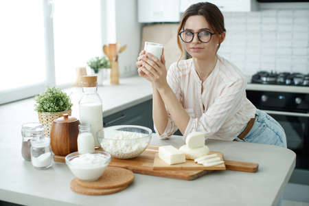 Woman with milk. Proper nutrition. High quality photoの写真素材