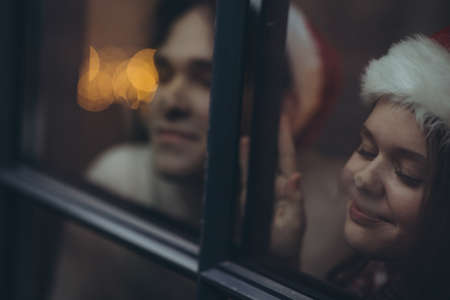 Boyfriend and girlfriend at Christmas. High quality photoの写真素材