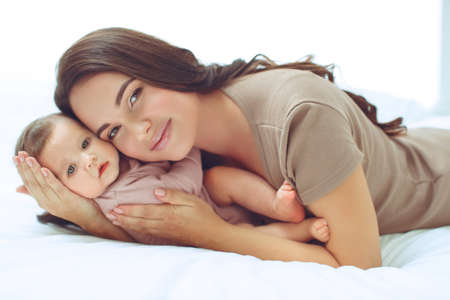 Mom with a baby at home. High quality photoの写真素材