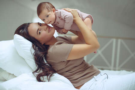 Mom with a baby at home. High quality photoの写真素材