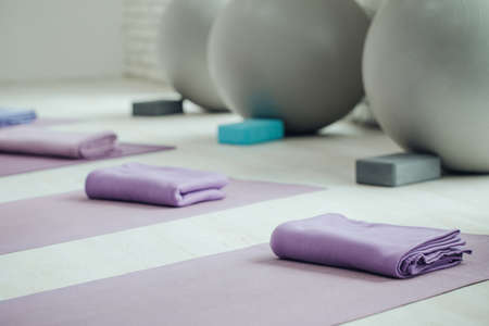 Yoga mats and balls. Yoga accessories, hall, room. High quality photoの写真素材