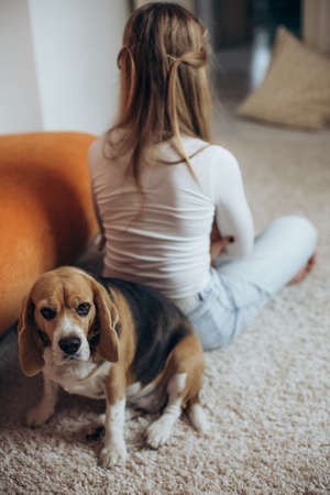 Teenage girl in depression in her room. High quality photoの写真素材