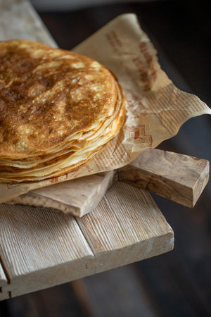 Thin pancakes. Shrovetide holiday on the table. High quality photo