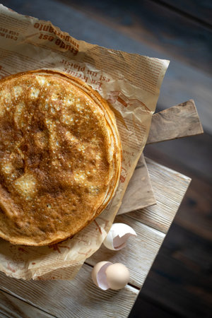 Thin pancakes. Shrovetide holiday on the table. High quality photo