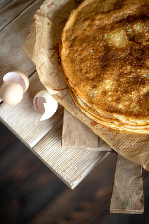 Thin pancakes. Shrovetide holiday on the table. High quality photoの写真素材
