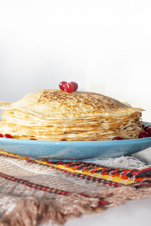 Homemade pancakes decorated with cranberry berries. Sweet food. Rusticの写真素材