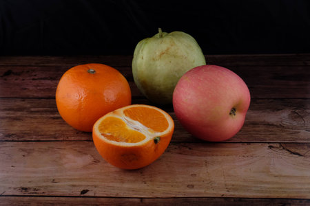 fruits mixing in wooden backgroundの写真素材