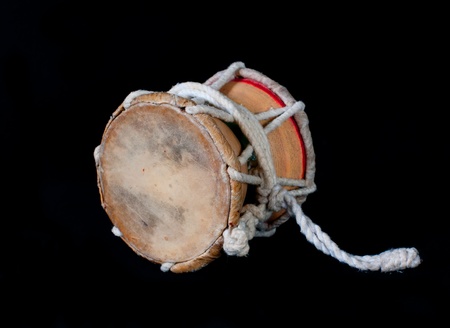 Damaru drum. Close-up. Black backgroundの写真素材