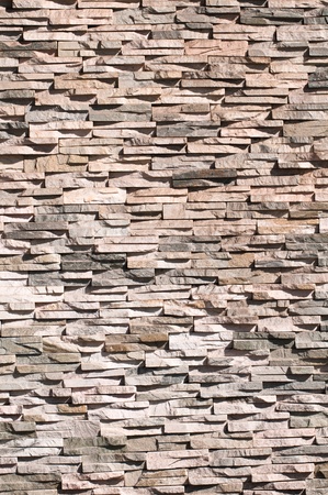 Close up stone wall texture with roughness surfaceの写真素材