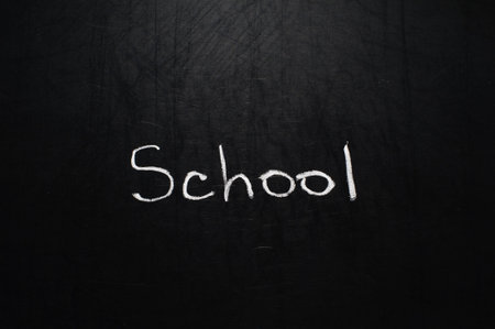 Conceptual phrase written on school board by chalk