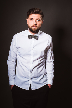 Studio portrait of young man with great beardのeditorial素材