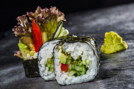 Vegetable roll - traditional sushi with pepper, avocado and cucumberの写真素材