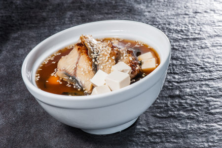 Traditional japanese soup with tofu, fried eel and misoの写真素材