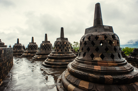 Stupa in Borobudur, ancient buddhist temple near Yogyakarta, Java, Indonesiaの写真素材