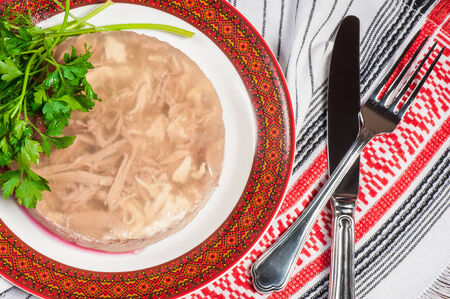 Traditional russian aspic with meat served with fresh parsleyの写真素材