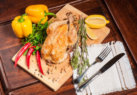 Fried spicy chicken with red hot chili peppersの写真素材