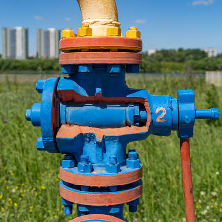 Gas-oil pipeline with shut-off valves and adapters. Shut-off valve in the cut close-up study guideの写真素材