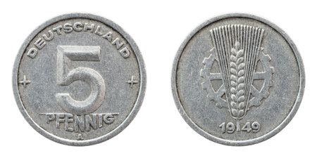 Old inactive coin 5 pfennig 1949 Germany DDR closeup isolated on white background