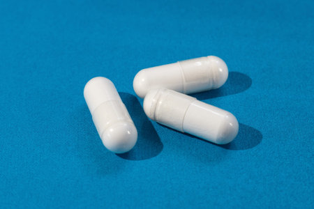Ampoules pills vitamin white powder in a soluble shell drink with water for the health of the body...