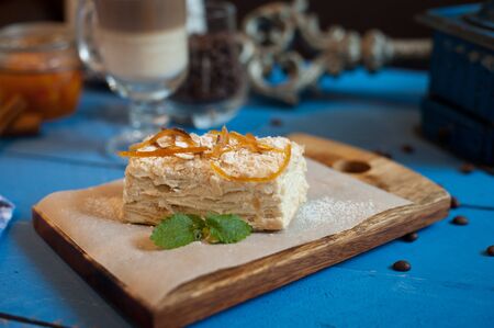 cake on a blue wooden backgroundの写真素材