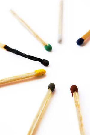 varicoloured matches on white background 