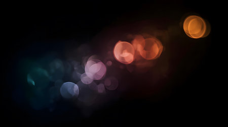 Colorful bokeh lights on black background. Abstract bokeh background.の素材
