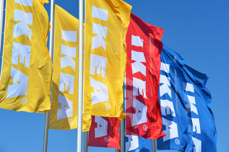 Hanover, Lower Saxony / Germany - April 21, 2019: IKEA flags against sky in Hanover, Germany - IKEA is the world's largest furniture retailer and sells ready to assemble furnitureのeditorial素材