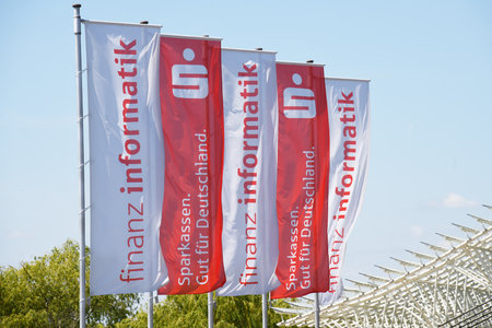 Hanover, Lower Saxony, Germany - May 21, 2020: Flags with a Logo of Finanz Informatik in Hanover, Germany - FI is an IT Partner for the financial sectorのeditorial素材