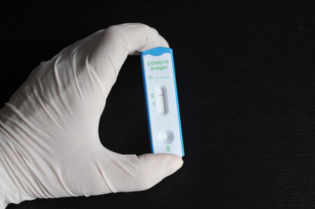 Burgdorf, Lower Saxyony, Germany - April 4, 2021: Covid-19 Antigen rapid test with negative test...