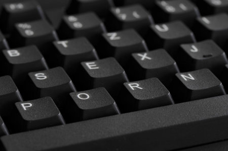 Changed computer keyboard symbolizes cybersex and porn consumption