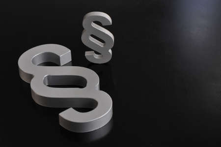 Two paragraph signs - symbol of law and justiceの写真素材