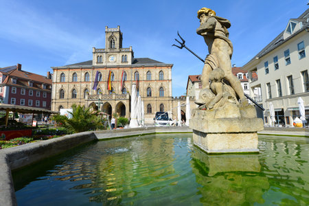 Weimar, Thuringia, Germany - May 11, 2016: View of the Town Hall of Weimar and market square with Neptune Fountain - Weimar, Germanyのeditorial素材