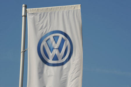 Weimar, Thuringa, Germany - May 12, 2016: Flag with the logo of automobile manufacturer Volkswagen in Weimar, Germanyのeditorial素材