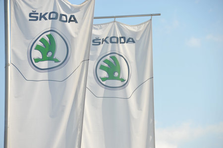 Celle, Lower Saxony, Germany - September 27, 2016: Flags with the logo of the car manufacturer Skoda...