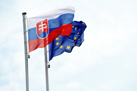 Berlin, Germany - May 22, 2017: Flag of the Slovak Republic and the flag of the European Union in...