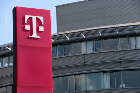 Bonn, Germany - May 14, 2018: Sign at the entrance to headquarters of Deutsche Telekom AG in Bonn, Germany - Telekom is a German telecommunications companyのeditorial素材