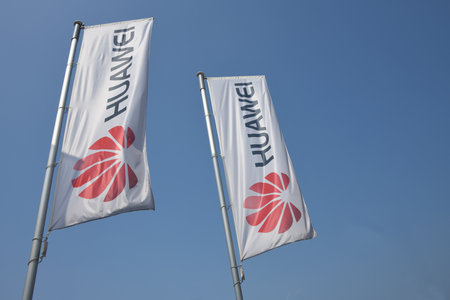 Bonn, North Rhine-Westphalia, Germany - May 18, 2018: Flags with the logo of Huawei in Bonn, Germany - Huawei is a Chinese telecommunications-equipment and consumer electronics companyのeditorial素材