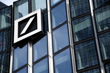 Frankfurt, Hesse, Germany - May 15, 2018: logo on the facade of Deutsche Bank AG in Frankfurt,...