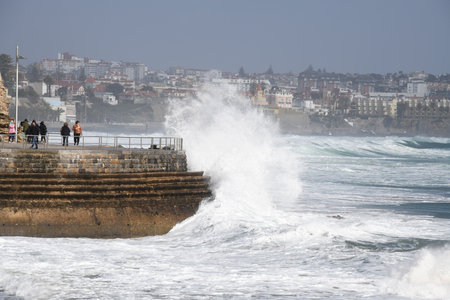 Cascais, Lisbon District, Portugal - March 11, 2018: High waves on the coastal promenade of Cascais near Lisbon, Portugalのeditorial素材